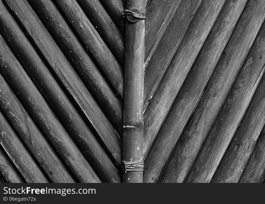 V shape pattern created from bamboo on wall. V shape pattern created from bamboo on wall