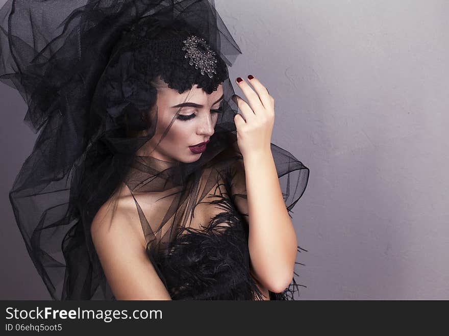 Portrait of young beautiful girl with black veil. Portrait of young beautiful girl with black veil