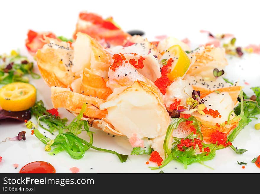 Lobster salad in japanese style with chuka seaweed and tobico