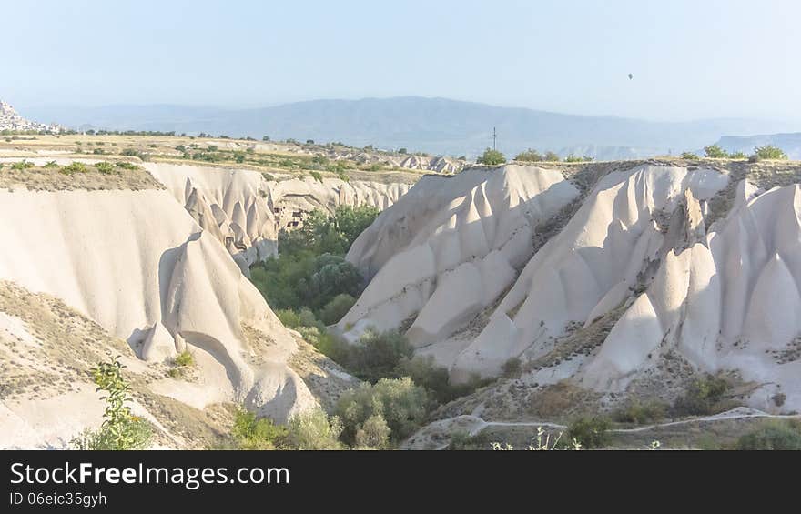 Warm Glow of Sunset on the Fairy Chimneys of Cappadocia, Popular Travel Destination in Central Turkey. Warm Glow of Sunset on the Fairy Chimneys of Cappadocia, Popular Travel Destination in Central Turkey