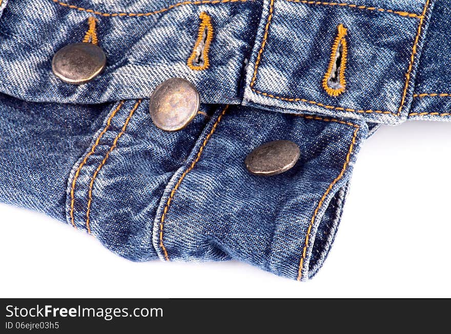 Unfasten Buttons on Blue Jeans closeup on white background