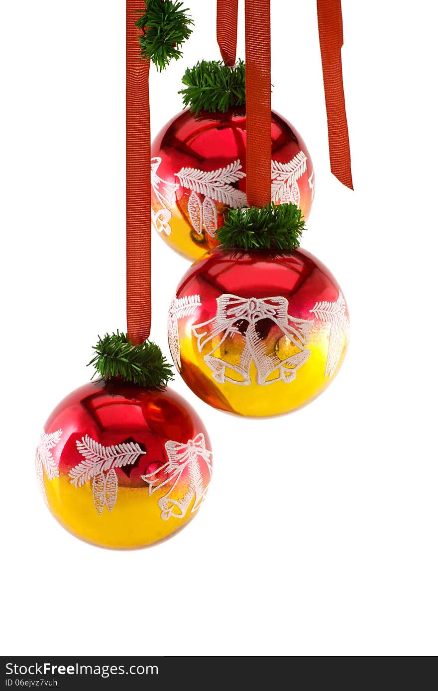 Christmas balls hanging on ribbon isolated on white