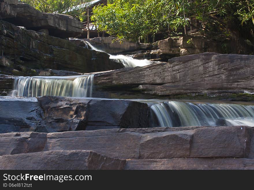 Waterfall river on the big dark rocks near Sihanoukville in Cambodia. Waterfall river on the big dark rocks near Sihanoukville in Cambodia