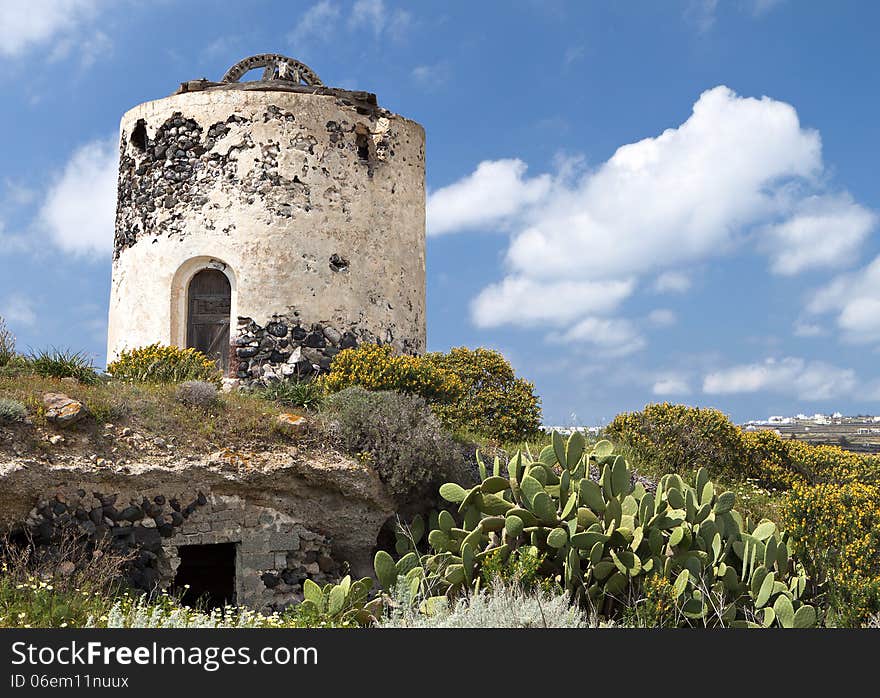 Santorini island in Greece. View of an old traditional windmill