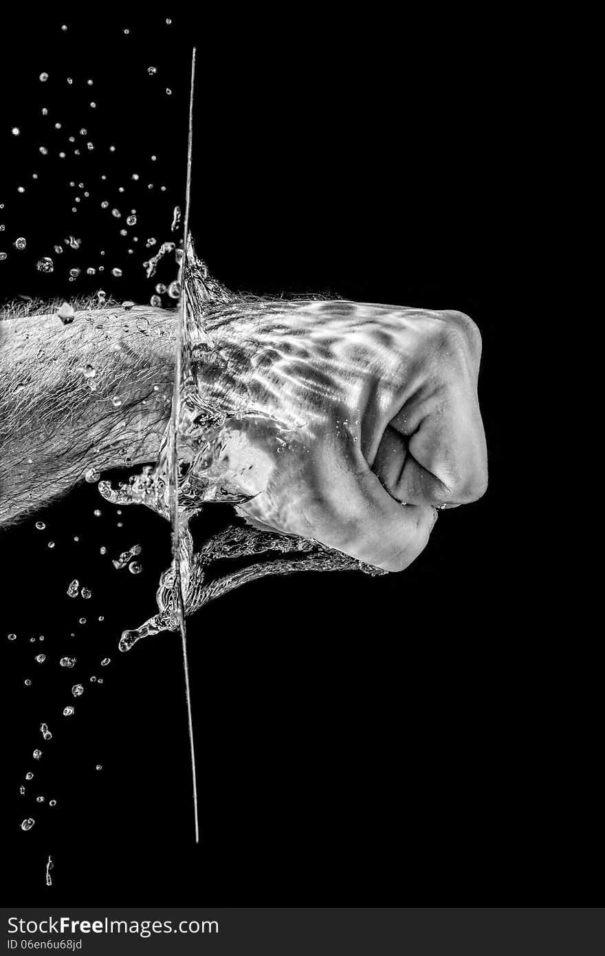 Splashing fist in black and white