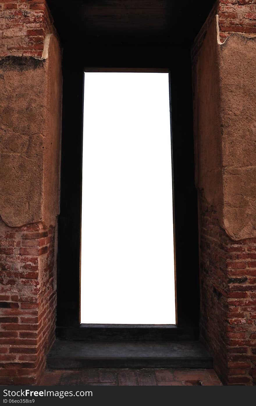 Ancient brick door with white space.Great for use as a creative frame.