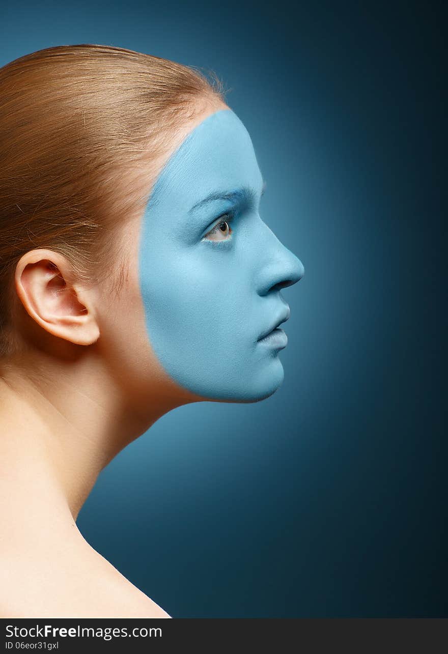 Young girl with facial mask. Medical or sports theme.