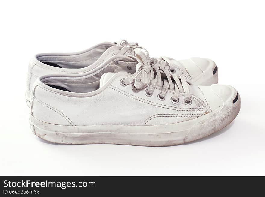 Dirty sneakers in white_sideway