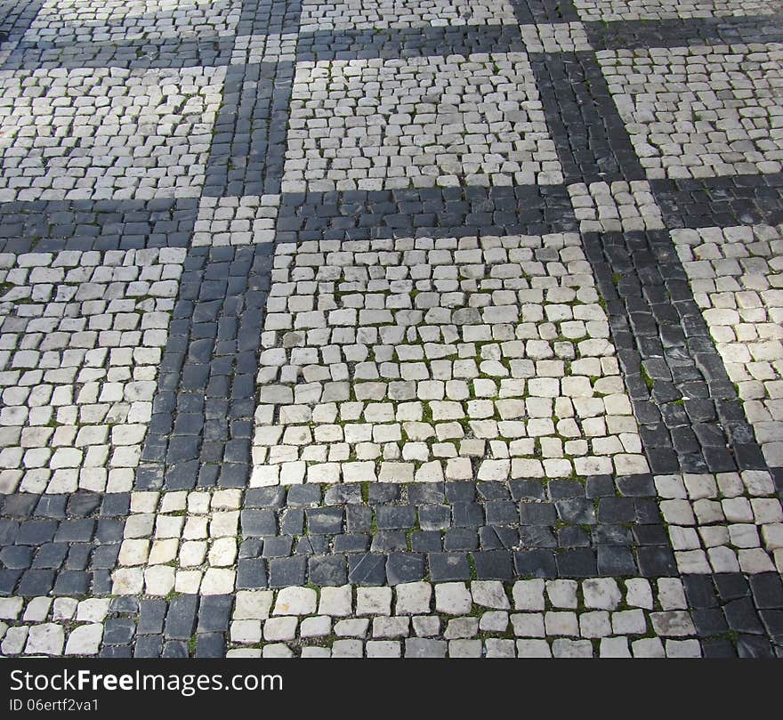 Cobblestone street with square pattern. Cobblestone street with square pattern