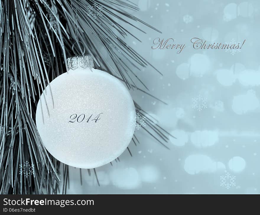 Merry Christmas postcard with simple decoration ball and blurred background. Merry Christmas postcard with simple decoration ball and blurred background