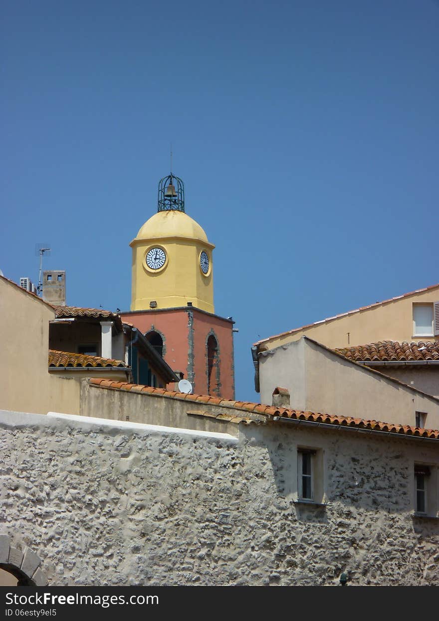 Tower of the church in Saint Tropez and blue sky.