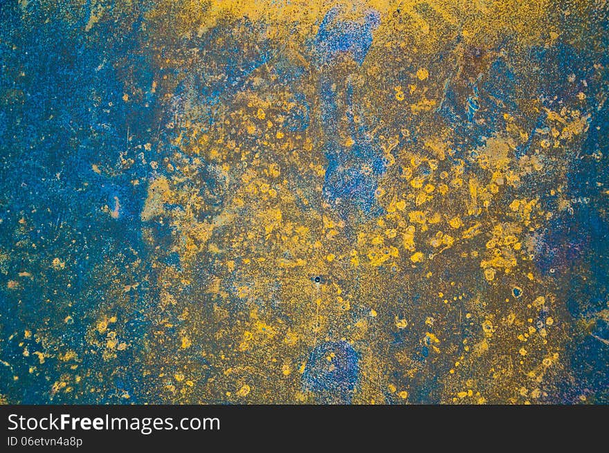 The rusty metal plate as colorful background. The rusty metal plate as colorful background