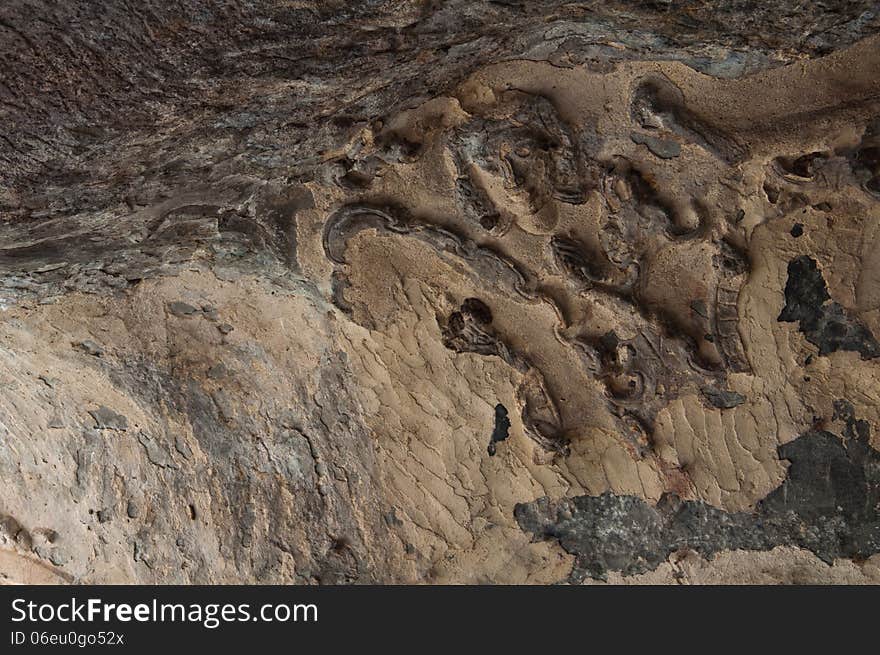 The stucco of ancient angle at the Khao Ngu Cave in Thailand