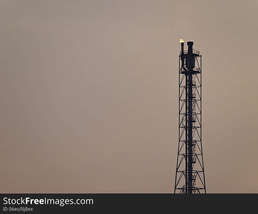 High tower distillation of refinery in twilight sky. High tower distillation of refinery in twilight sky