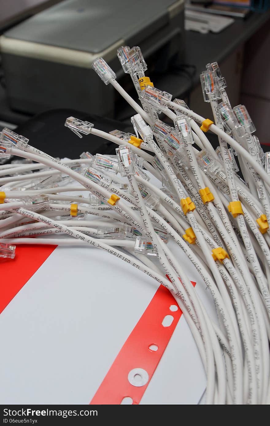 A bunch of gray network cables close up link