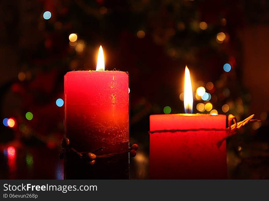 Two red candles with bokeh. Two red candles with bokeh