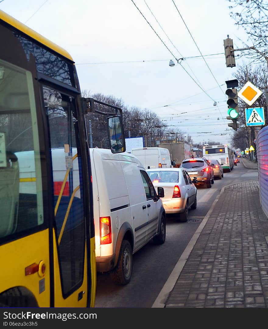 Cars stand in a jam on the city street. Cars stand in a jam on the city street