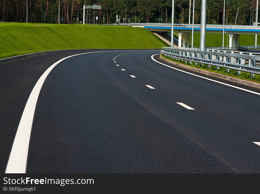 Highland road. bridge and grass