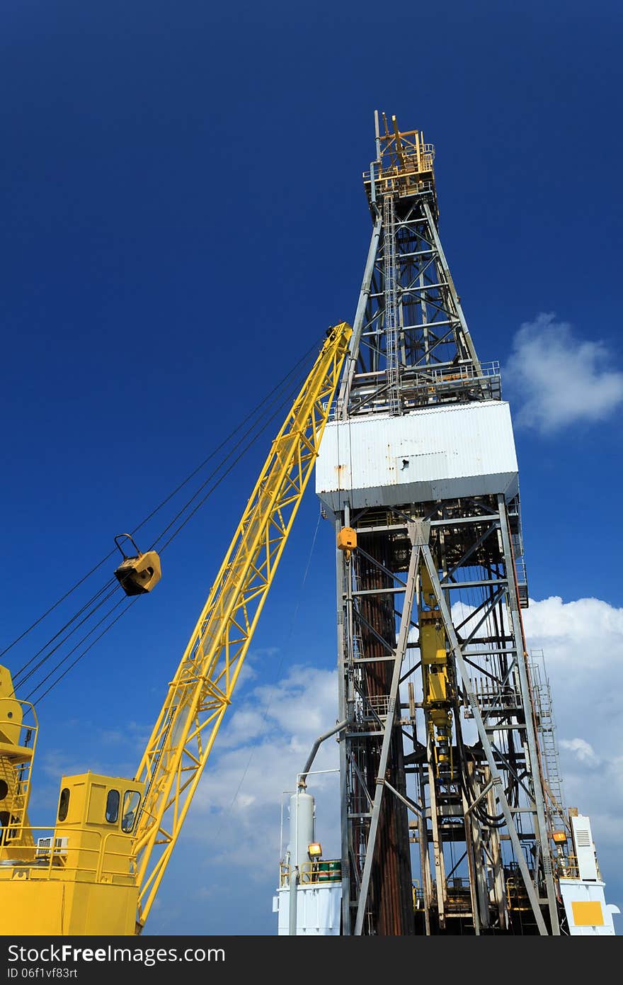 Derrick of Offshore Drill Rig and Rig Crane with Blue Sky