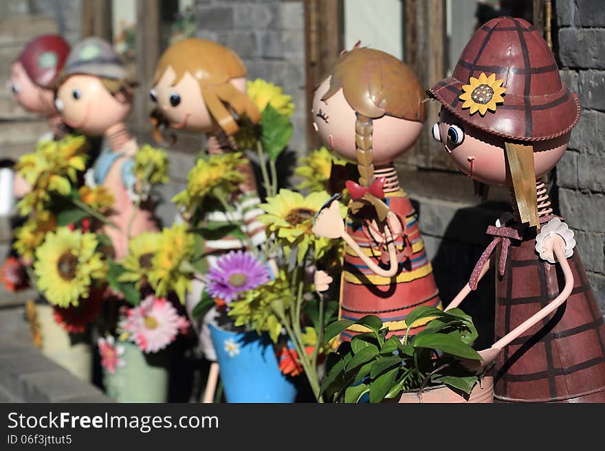 A row of pretty dolls as decoration