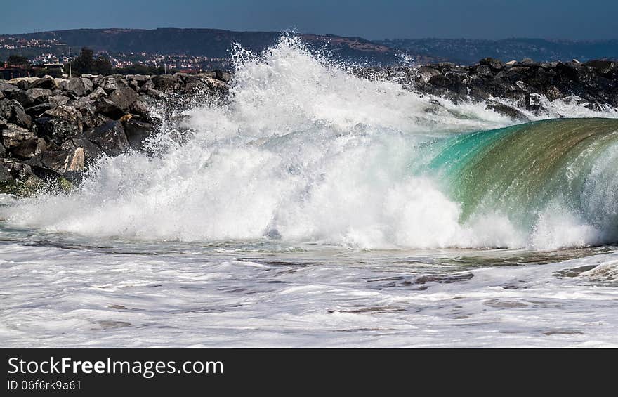 Big wave rolling towards the shore in Balboa Peninsula, CA. Big wave rolling towards the shore in Balboa Peninsula, CA.