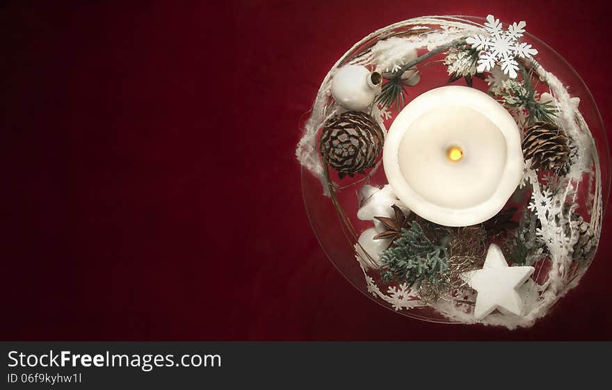 Winter Decoration With Candles On Red Background