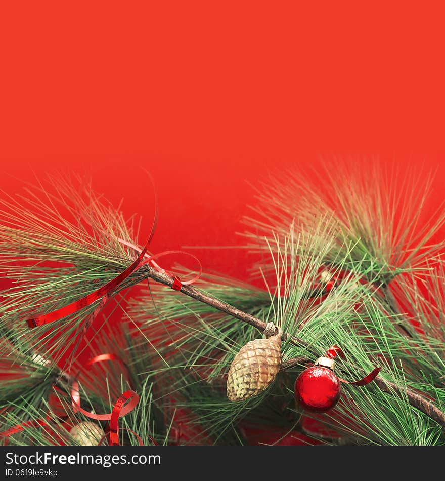 Green Pine branches with Christmas decorations