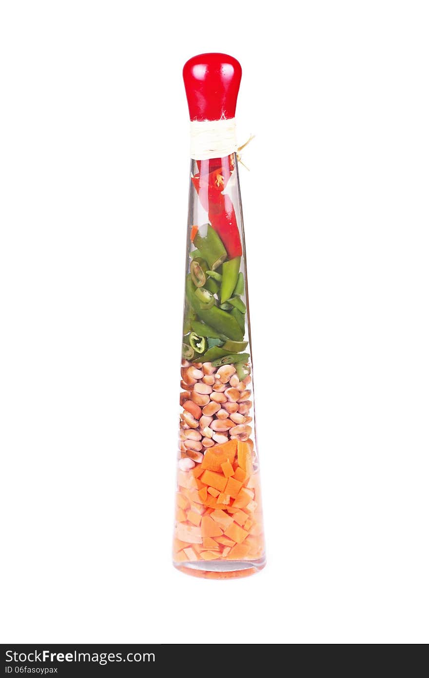 A nice decorative bottle with vegetables