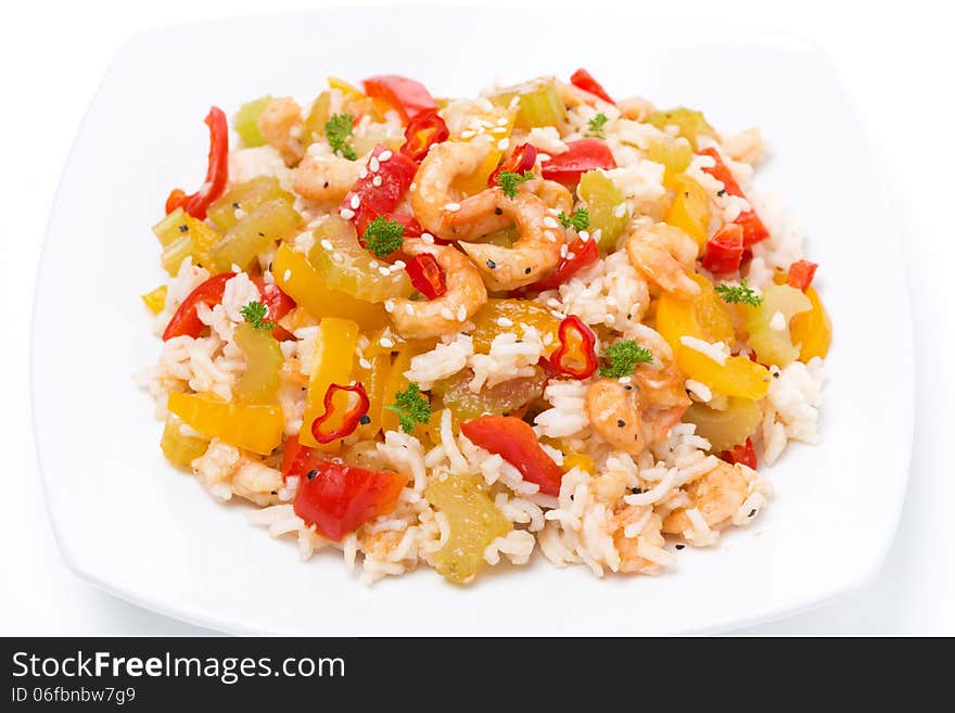 Chinese food - rice with vegetables and shrimps, top view, close-up