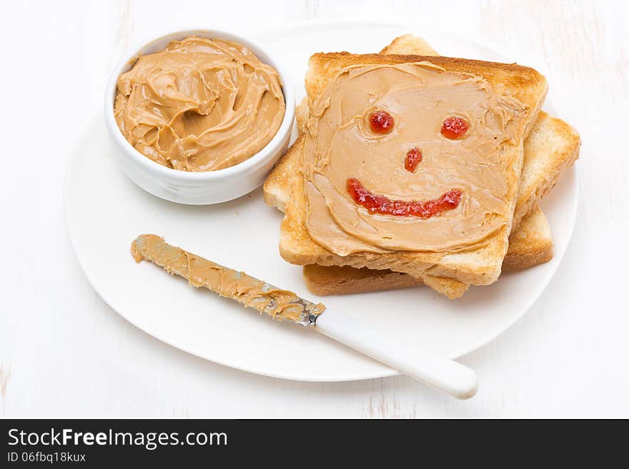 Toast With Peanut Butter And A Painted Smile, Top View