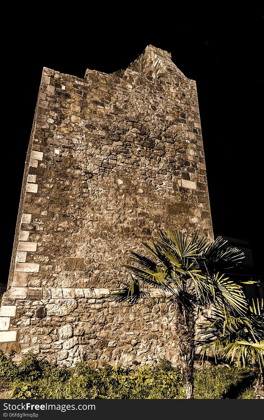 Old tower in italian little town