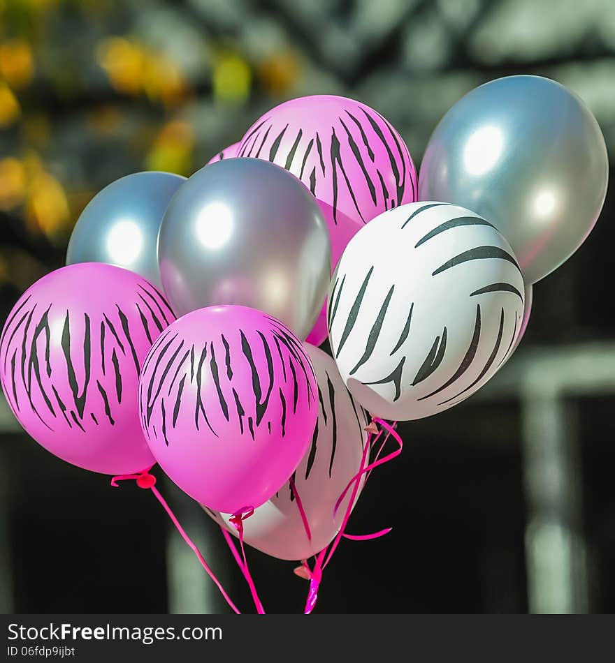 Pink and white zebra balloons at breast cancer awareness