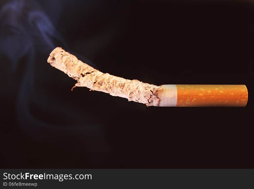 Cigarette on a black background