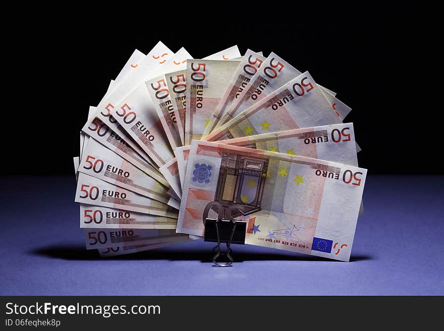 European Union currency bank notes as fan on dark background