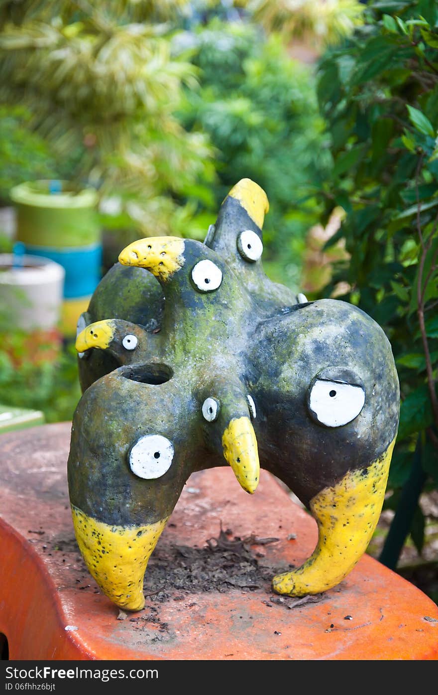 The pottery as crow with many head for decorate in the garden