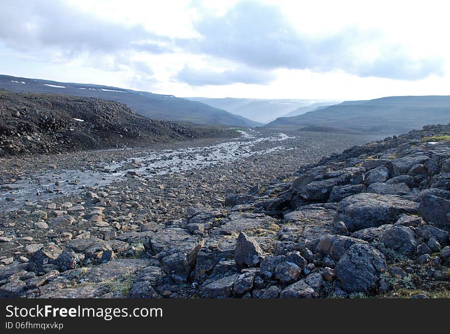 Rocky canyon of the mountain river. Russia, Taimyr Peninsula, Putorana plateau. Rocky canyon of the mountain river. Russia, Taimyr Peninsula, Putorana plateau.