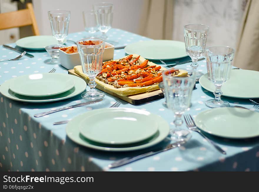 Christmas table with tableware and food. Christmas table with tableware and food