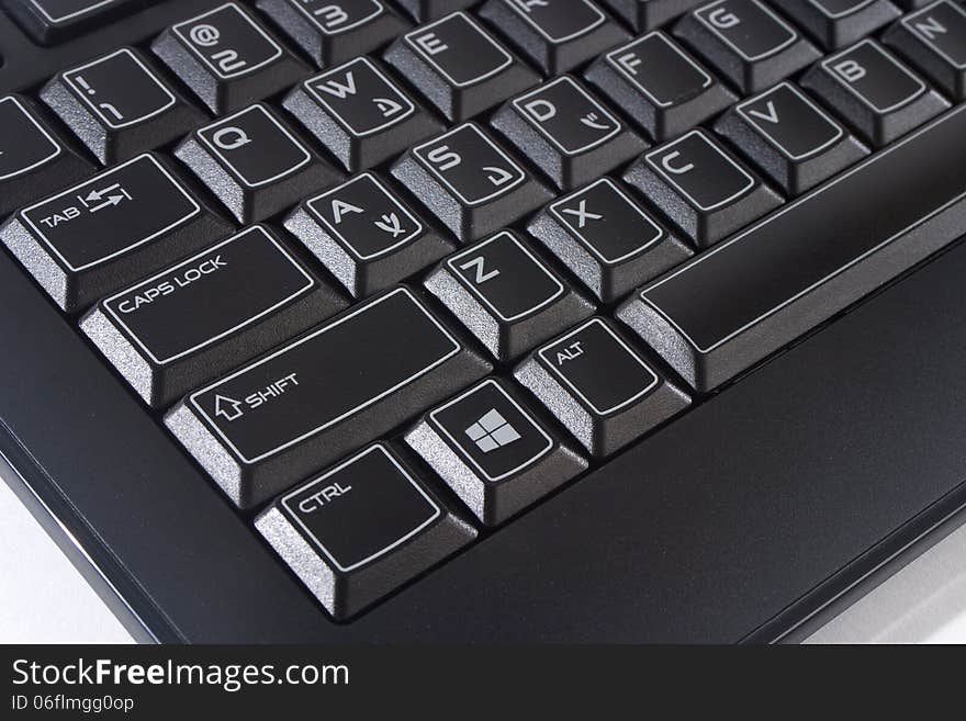 Black computer keyboard with white letters