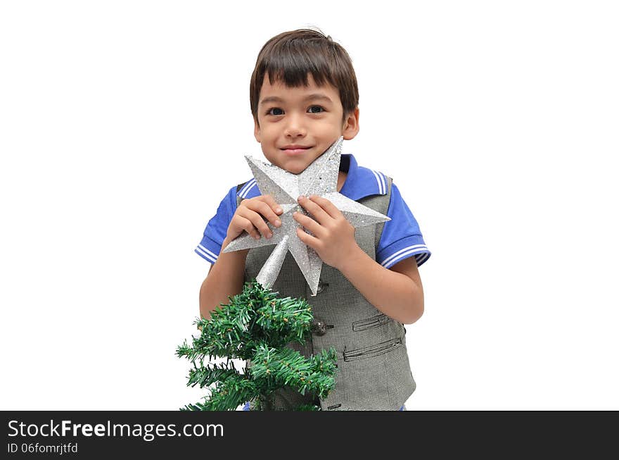 Little boy holding star christmas tree on white background