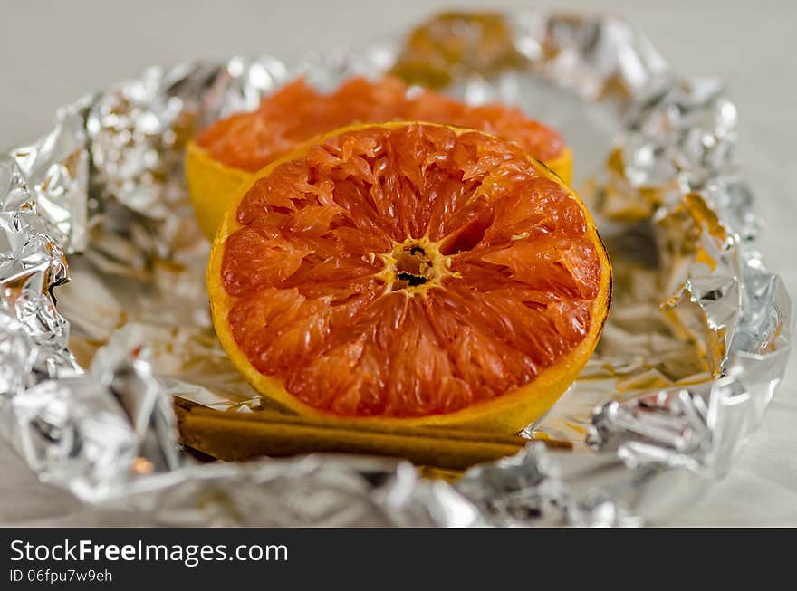 Baked grapefruit in alluminum foil paper.