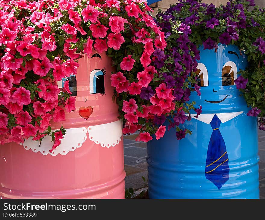 Creative funny beautiful street flower pots Italy. Creative funny beautiful street flower pots Italy