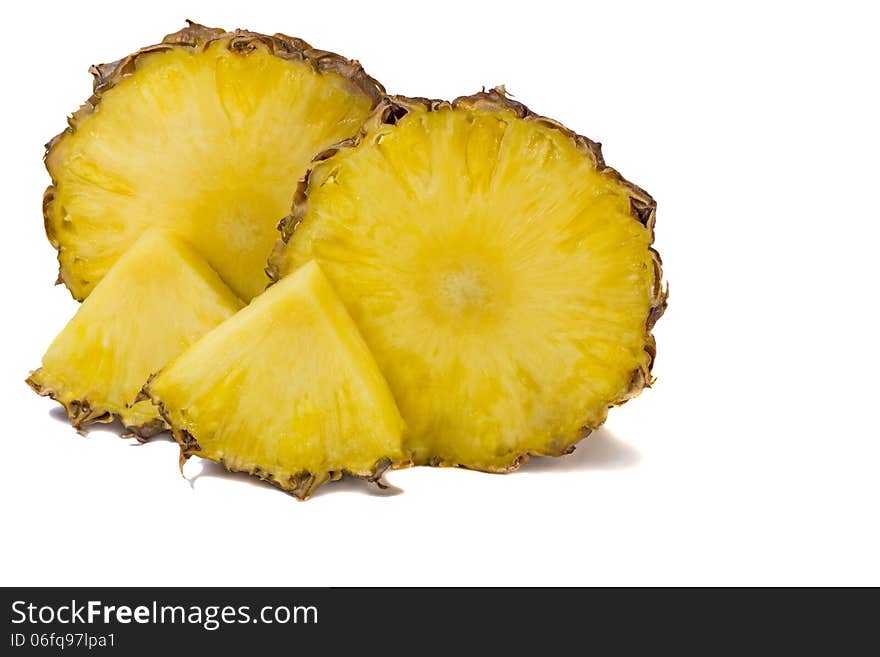 Cut off from the pineapple slices on white background.