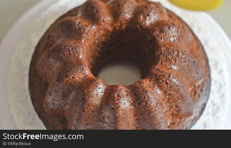 Decorating cake with orange royal icing