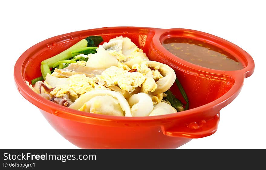 Thai-style sukiyaki on white background.