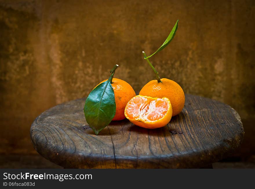 Fresh orange on an old chair,still life. Fresh orange on an old chair,still life