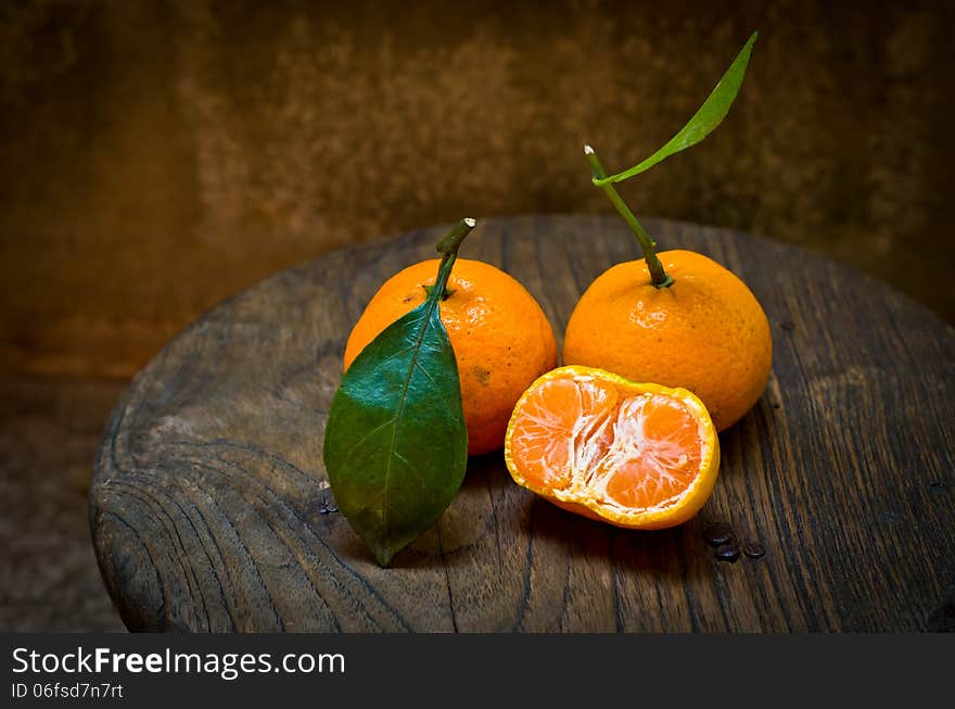 Fresh orange on an old chair,still life. Fresh orange on an old chair,still life