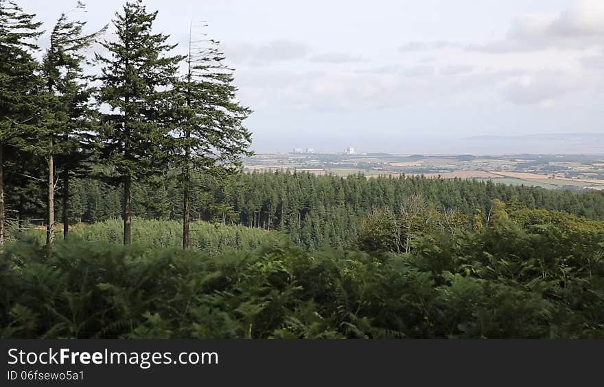 View from the Quantock Hills Somerset England views towards Hinkley Point Nuclear Power station and Bristol Channel. View from the Quantock Hills Somerset England views towards Hinkley Point Nuclear Power station and Bristol Channel