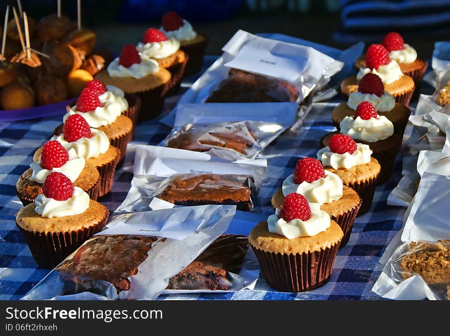 A selection of cakes for sale at a local market. A selection of cakes for sale at a local market.