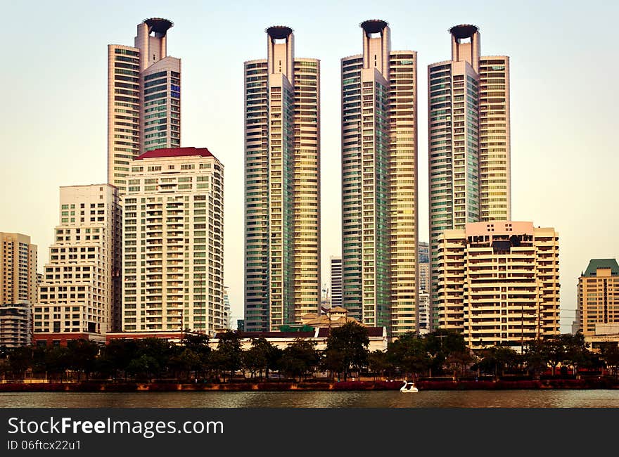 City Skyscrapers at evening in the sunset, Thailand