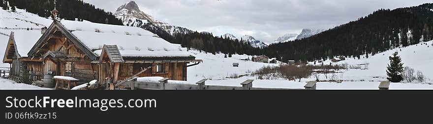 Dolomite winter panorama of typical hut. Dolomite winter panorama of typical hut